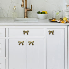 Load image into Gallery viewer, Set Of Six Brass Ribbon Tie Bow Knobs