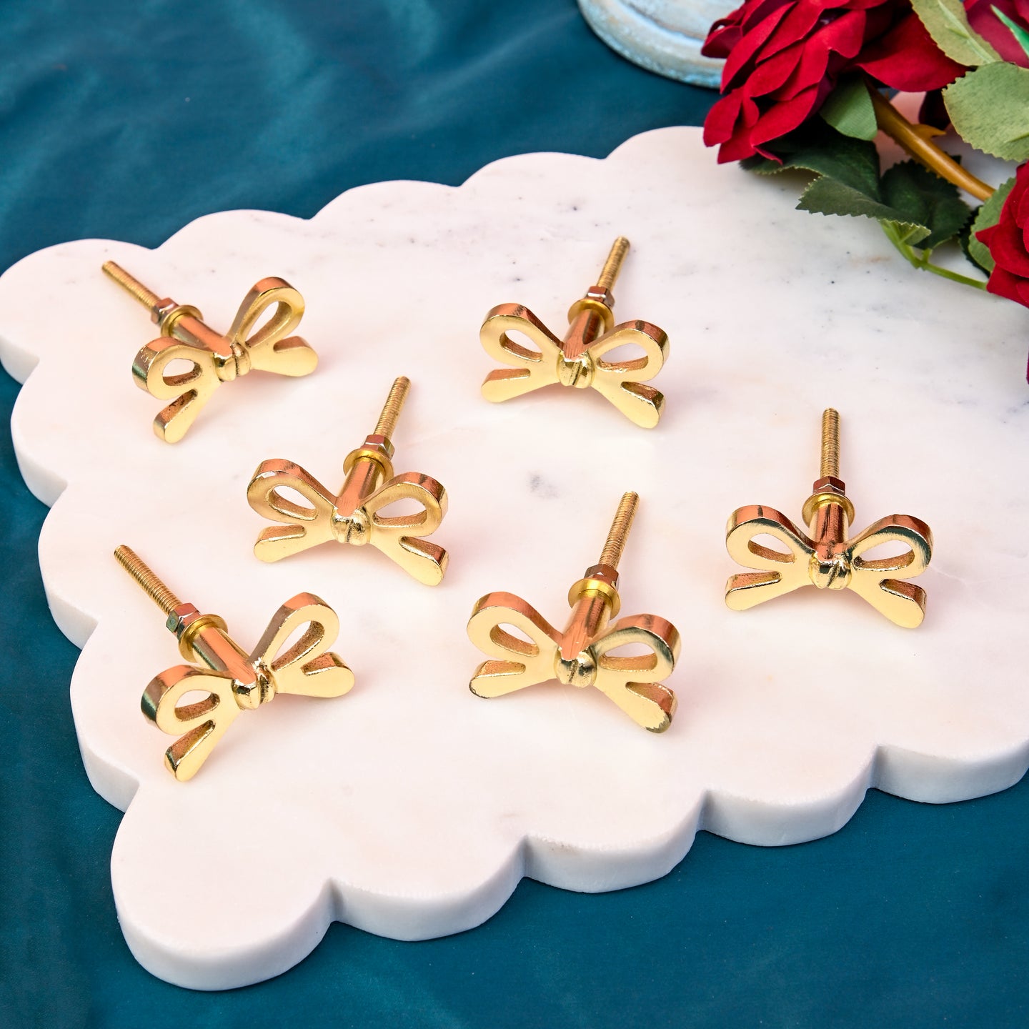 Set Of Six Brass bow ribbon Knobs
