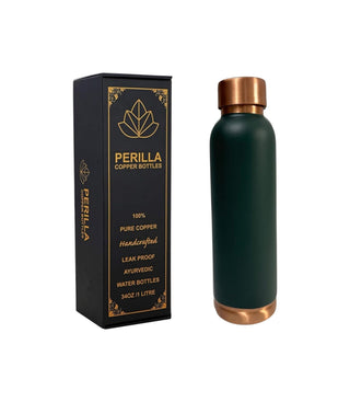 Green copper water bottle with packaging on a white background